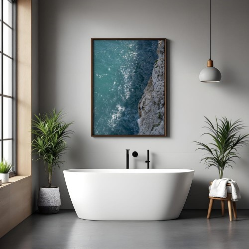 plakat polignano a mare na skraju błękitu w łazience