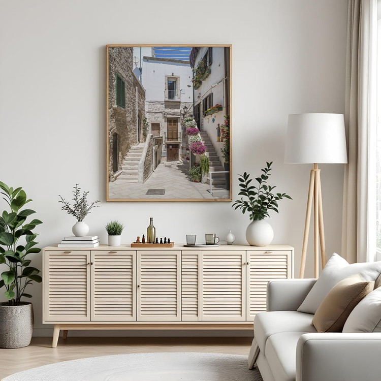 plakat polignano a mare uliczka starego miasta nad komodą