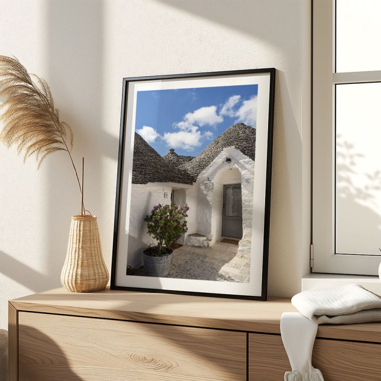 plakat alberobello białe trulli z białym obramowaniem w czarnej ramie