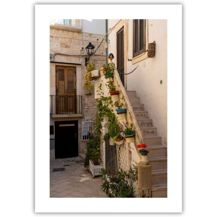 plakat polignano a mare zakątek w apulii z białym obramowaniem