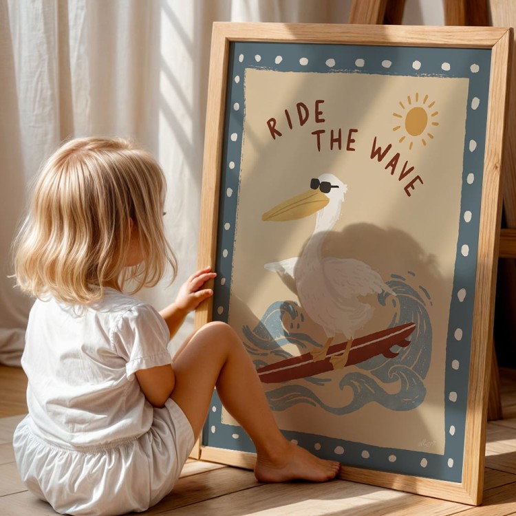 plakat pelikan na fali w drewnianej ramie