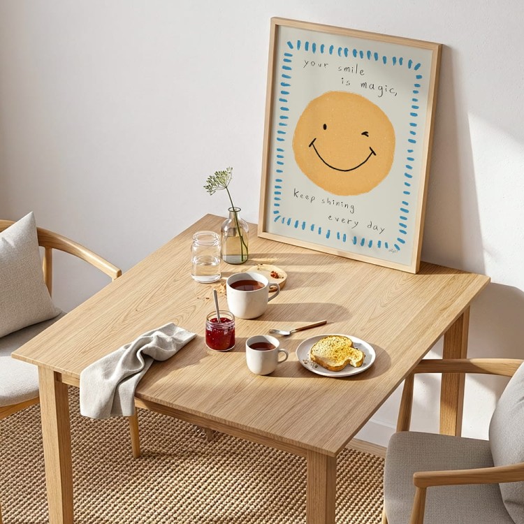 plakat twój uśmiech to magia w drewnianej ramce w jadalni
