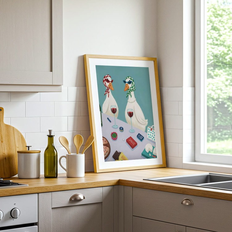 plakat gęsie pogaduszki z białym obramowaniem w kuchni