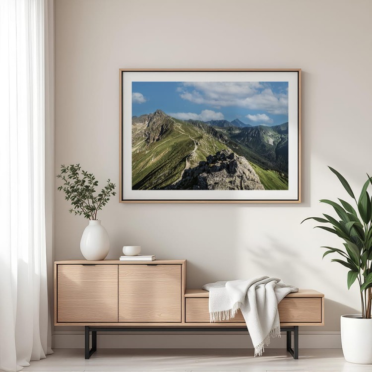 plakat tatry widok z kasprowego wierchu z białym obramowaniem nad komodą