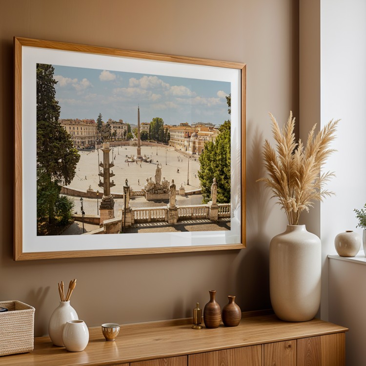 plakat rzym piazza del popolo z białym obramowaniem w drewnianej ramie nad komodą