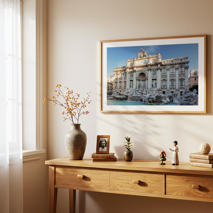 plakat rzym fontanna di trevi z białym obramowaniem w drewnianej ramie nad komodą
