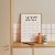 plakat kalendarz 2027 classic white w kuchni w drewnianej ramce
